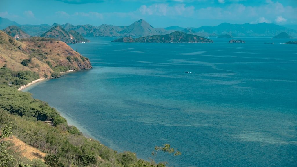 A large body of water surrounded by mountains