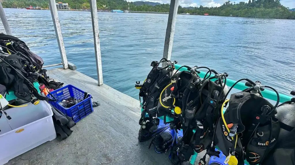 Scuba gear ready on a dive boat deck
