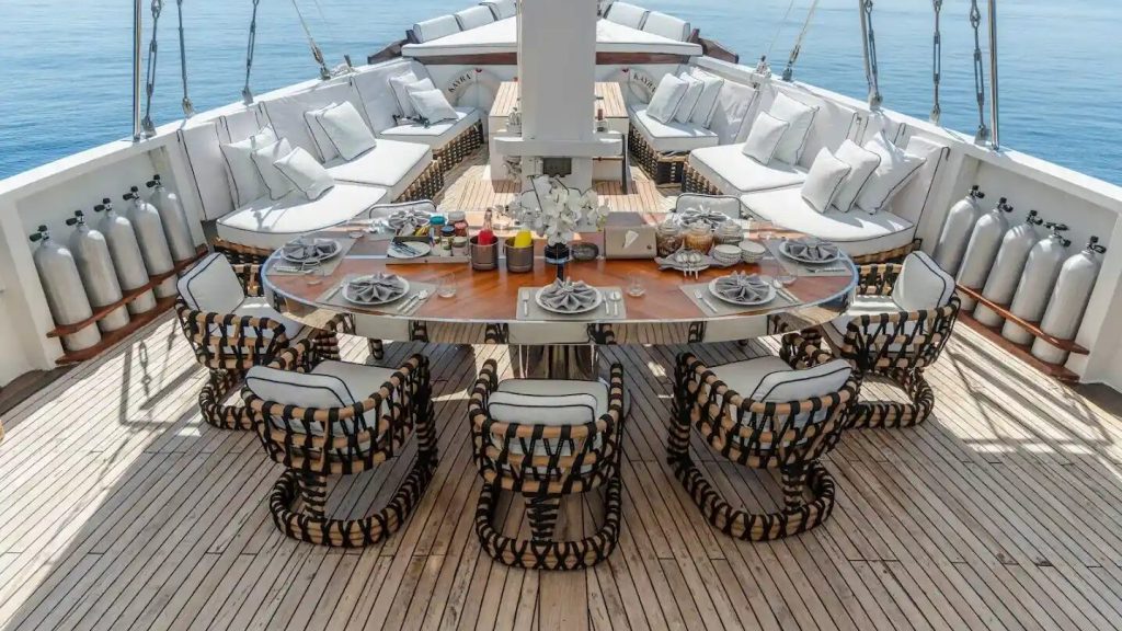 The dining table on the deck of a luxury phinisi